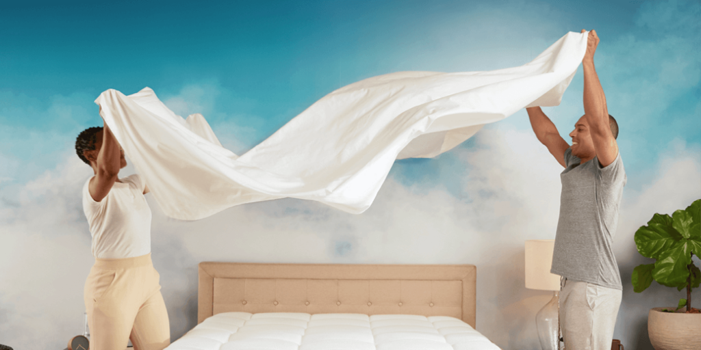 A picture containing person, indoor, bed, personDescription automatically generated