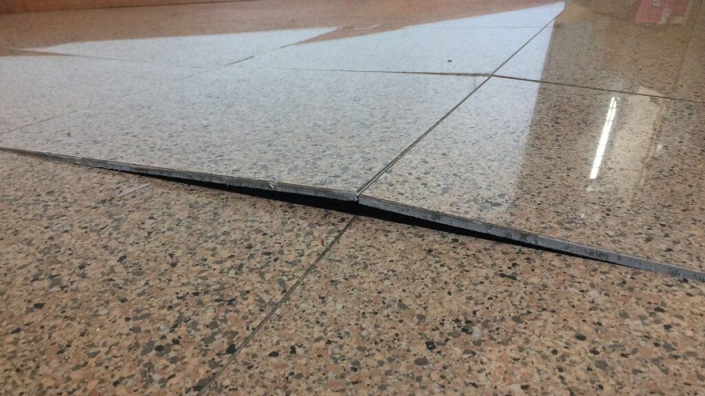 Why Tiles Get Popped Up and How to Prevent It